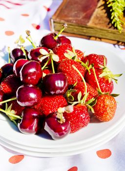 cherries and strawberries from the garden