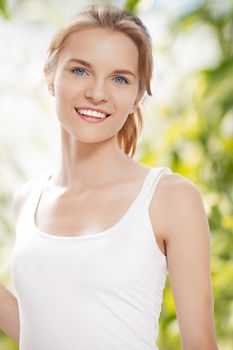 picture of happy and smiling teenage girl outdoors