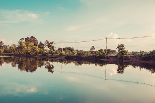 Pond and water reflection in spring nature in Thailand vintage