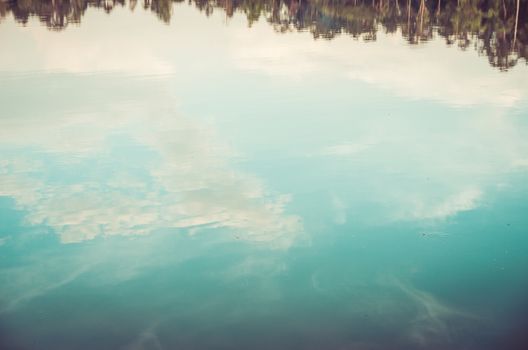 Pond and water reflection in spring nature in Thailand vintage