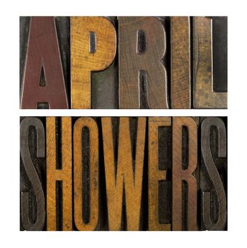 The words APRIL SHOWERS written in vintage letterpress type