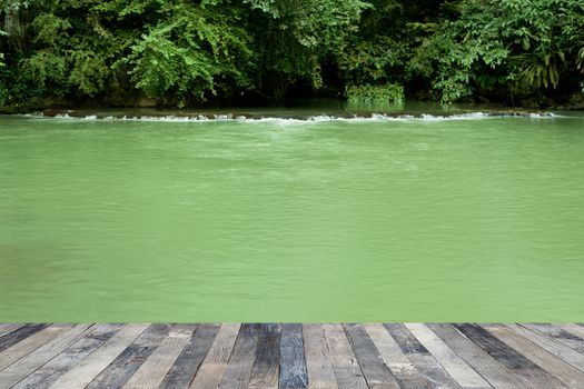 View of the waterfall above a wooden floor