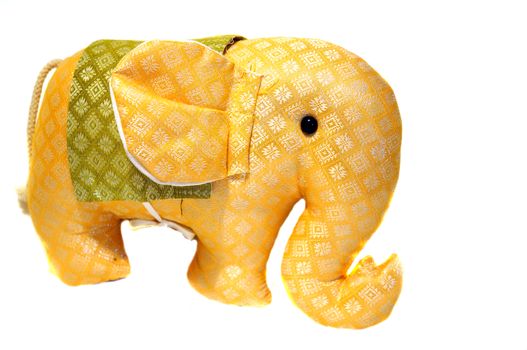 Toy orange patterned fabric elephant from Thailand                               