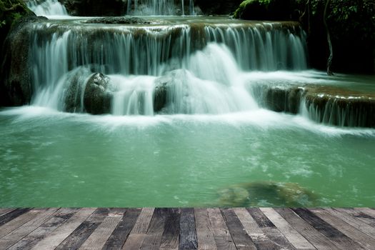 View of the waterfall above a wooden floor
