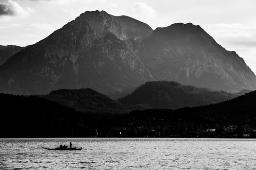 Small boat on the lake in mountains Austria