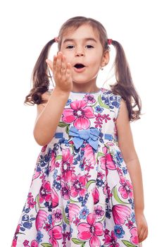 young girl on white background waving at camera