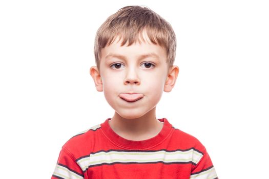 portrait of a young boy whit tongue out on white background