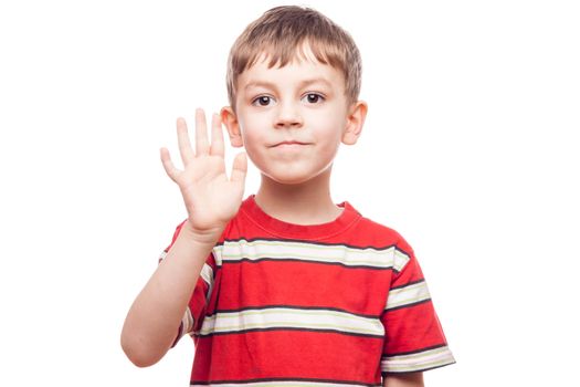 portrait of a young boy waving on white background