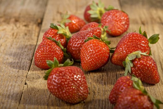 fresh strawberries on wood. 