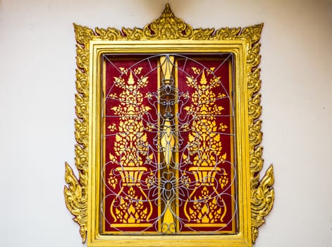 Temple in Thailand A window with many beautiful decorative art.