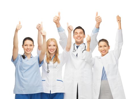 professional young team or group of doctors showing thumbs up