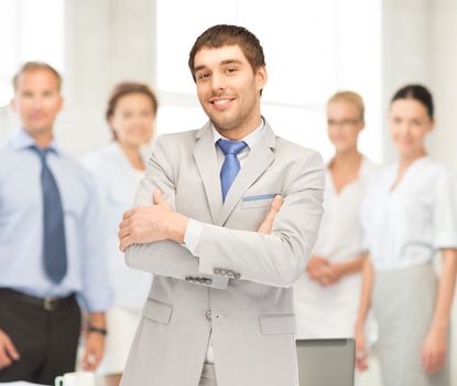 picture of happy and smiling businessman in office