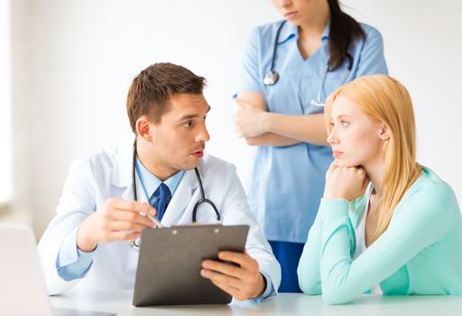 bright picture of male doctor with patient