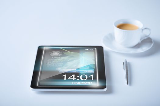 business and technology concept - tablet pc and cup of coffee