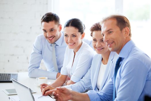 friendly business team having meeting in office