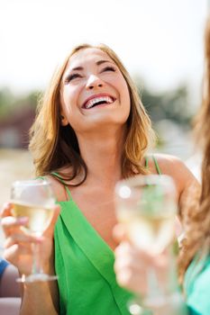 summer holidays, vacation and celebration - girl with champagne glass