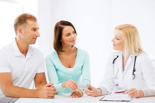 healthcare and medical - doctor giving pills to patients