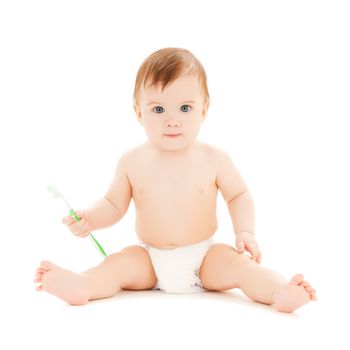bright picture of curious baby brushing teeth.