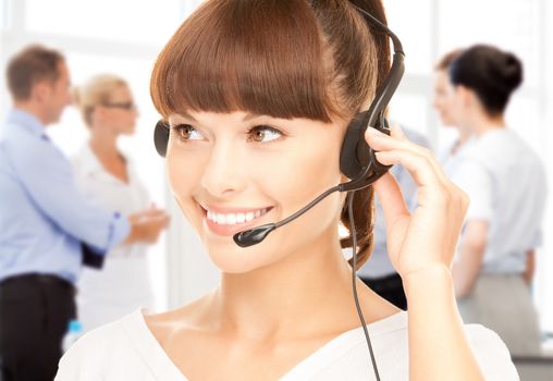 business and technology concept - helpline operator with headphones in call centre