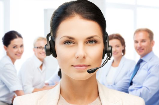 business and technology concept - helpline operator with headphones in call centre