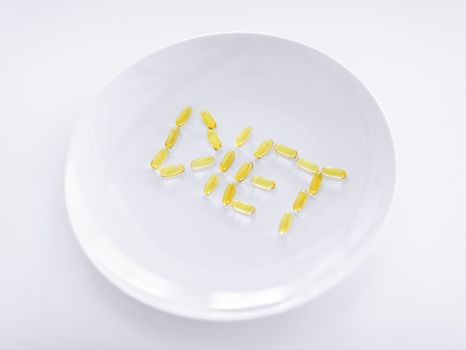 sport, healthcare and diet concept - plate with meds