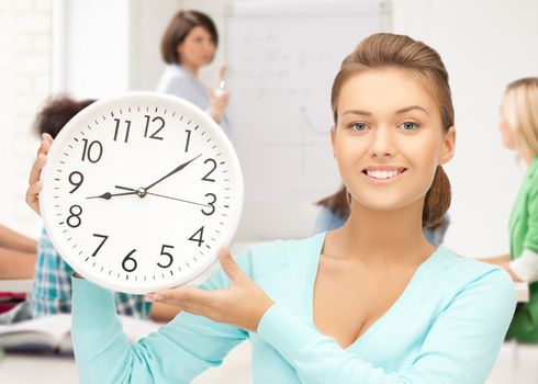 education and time management - attractive student pointing at clock