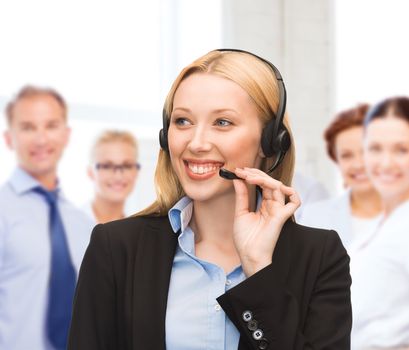 business and technology concept - helpline operator with headphones in call centre