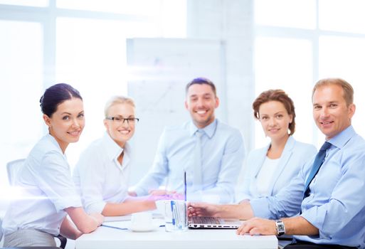 business and office concept - business team having meeting in office