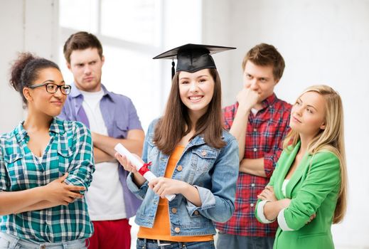 education and competition concept - girl in graduation cap with certificate and students