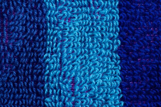 Striped Background of Navy Blue and Blue Fluffy Cotton Rows closeup