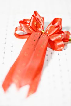 Decoration red glossy ribbon bow on ribbon print word valentine