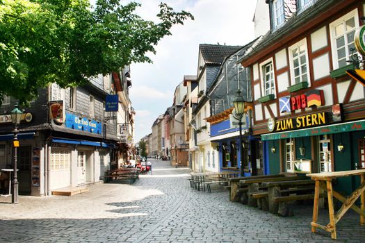 FRANKFURT AM MAIN,GERMANY,MAY The 4th 2014: Alt Sachsenhausen district preserves old fashioned charm with narrow cobblestone streets and many charming bars and pubs.