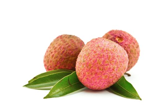 fresh lychees on white background