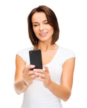 education, technology and internet - young woman browsing in smartphone