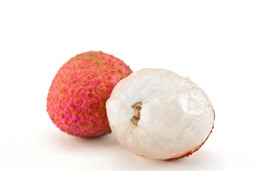 fresh lychees on white background