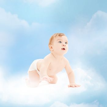 childhood and child care concept - smiling baby sitting on the cloud