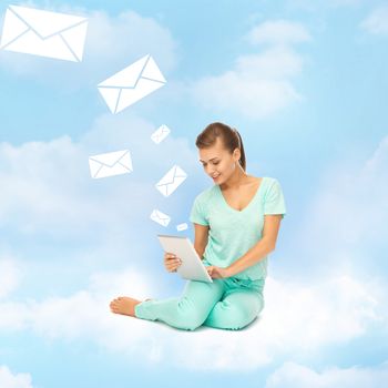 education and technology concept - young woman sitting on the cloud with tablet pc