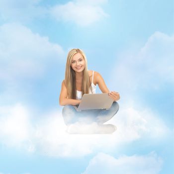 education and technology concept - young woman sitting on the cloud with laptop