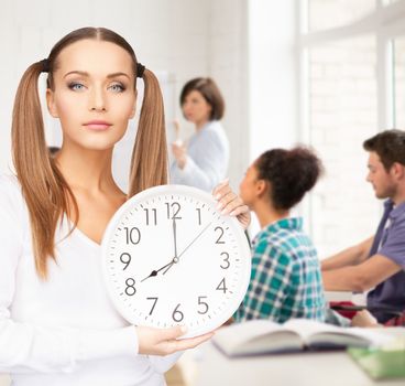 education and time management concept - attractive student showing clock