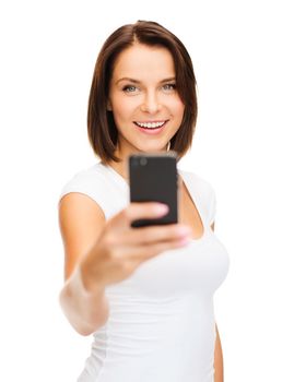 business, education, technology and internet concept - happy woman with smartphone