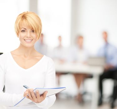 office, buisness, education concept - happy woman with big notepad