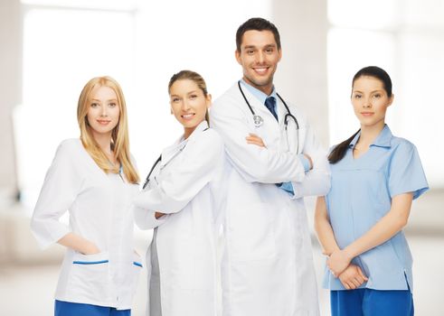 healthcare, hospital and medical concept - young team or group of doctors