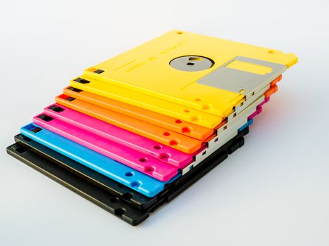 A floppy disk, or diskette, is a disk storage medium composed of a disk of thin and flexible magnetic storage medium, sealed in a rectangular plastic carrier lined with fabric that removes dust particles.