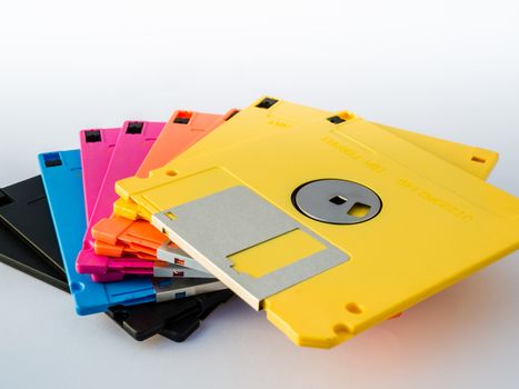 A floppy disk, or diskette, is a disk storage medium composed of a disk of thin and flexible magnetic storage medium, sealed in a rectangular plastic carrier lined with fabric that removes dust particles.