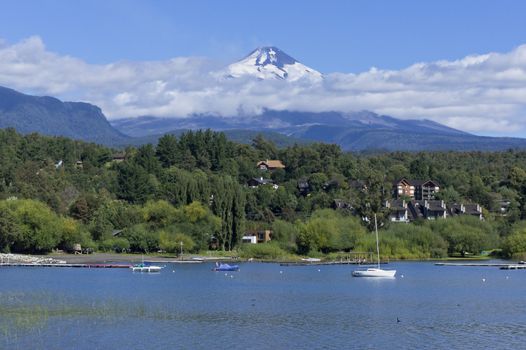 Patagonia, Chile. Pucon, smoke over Villarrica volcano. View from lake Villarrica