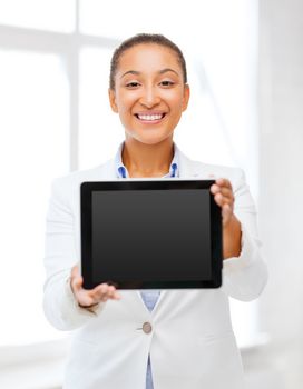 office, business, technology and internet concept - businesswoman with tablet pc in office