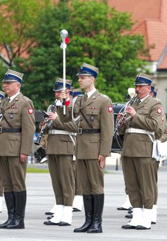 Warsaw, Poland – May 12, 2014: Danish Crown Prince Couple on state visit to Poland. Polish military band performing during parade.