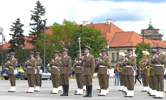 Warsaw, Poland – May 12, 2014: Danish Crown Prince Couple on state visit to Poland. Polish military band performing during parade.