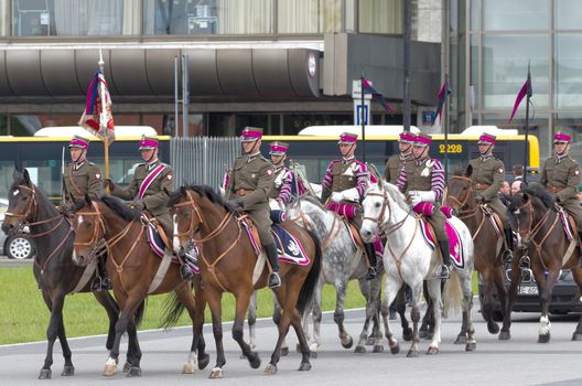 Warsaw, Poland – May 12, 2014: Danish Crown Prince Couple on state visit to Poland. Polish cavalrymen at the military parade.