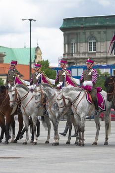 Warsaw, Poland – May 12, 2014: Danish Crown Prince Couple on state visit to Poland. Polish cavalrymen at the military parade.